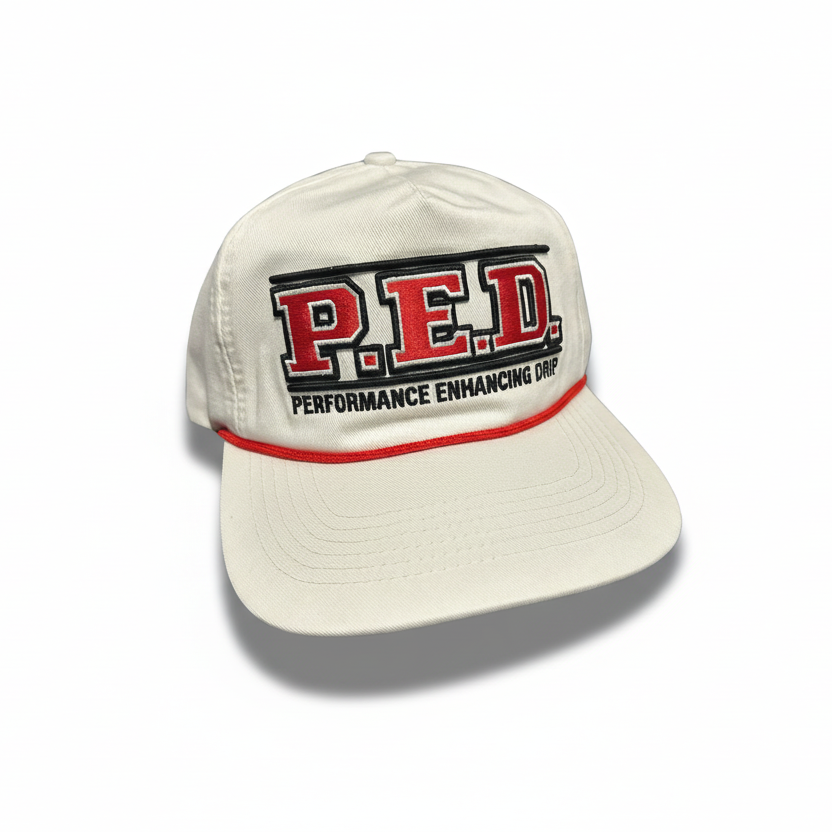 White cap with 'P.E.D. Performance Enhancing Drug' text on a white background